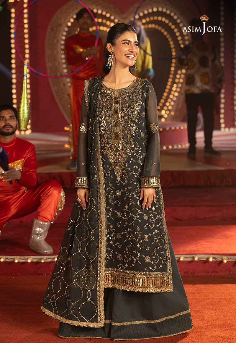 Model showcasing Asim Jofa's Festive Collection 25 AJLLF-02 in deep green with gold embroidery and elegant design.